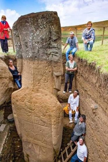 What looked like a rock on the surface was a giant statue discovered on Easter Island this week, The ones not buried have been weathered to the point that none of the detailed carving on the Moai are visible.